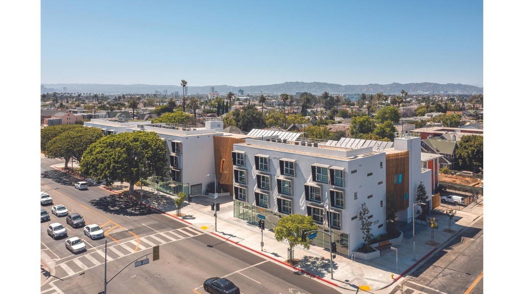 a photograph of a complex of apartments and condominiums