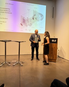 Vivila Leigh (MArch '25) is presented with her award at the 2025 Vitruvian Awards ceremony in New York on September 18