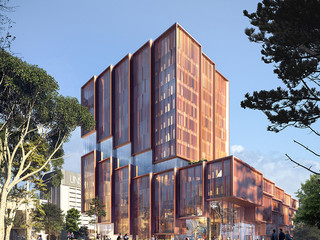 Rendering of a red brick building on a university campus