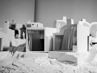 Elevational black and white photograph of physical model